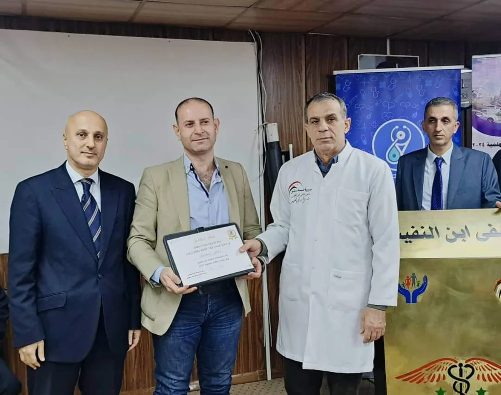 الدكتور رامي إسماعيل خلال مناسبة تكريم مهنية